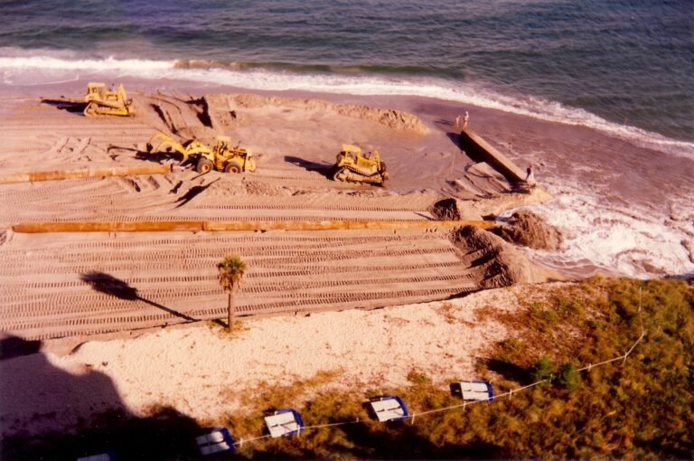 Beach reclamation, northern Broward County Florida, August 1996. Dredges pump sand in from sea floor off shore onto the