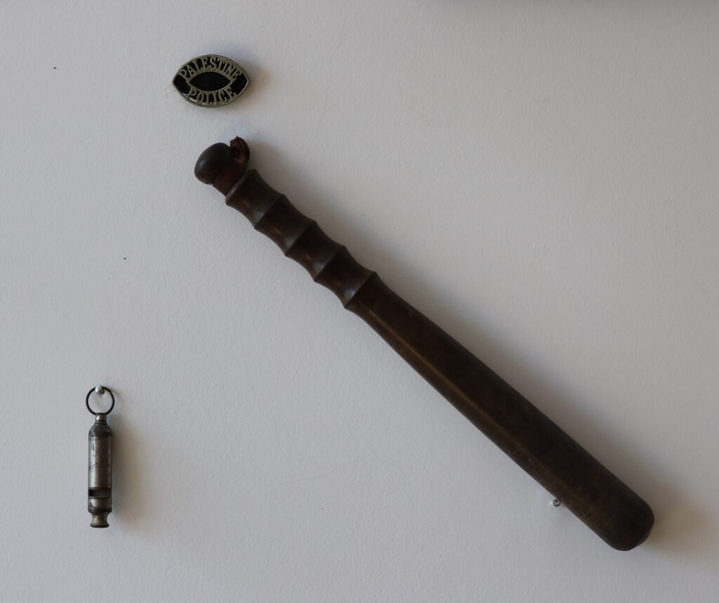 A whistle, baton and badge, used by the Mandatory Palestine Police Force