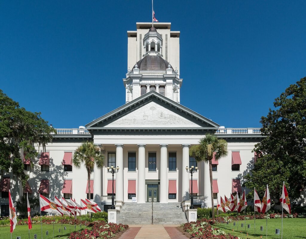 An east view of the old Florida State Capitol, Tallahassee. The new capitol is visible in the background