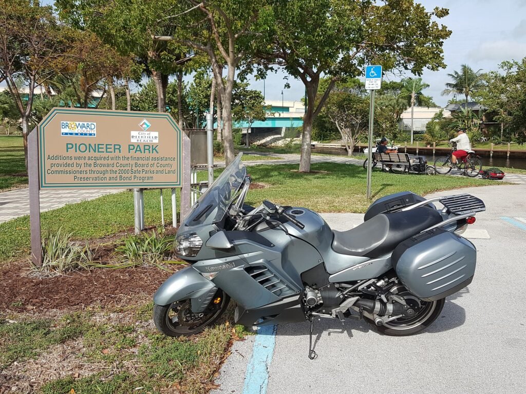 Pioneer Park Deerfield Beach sign with motorcycle