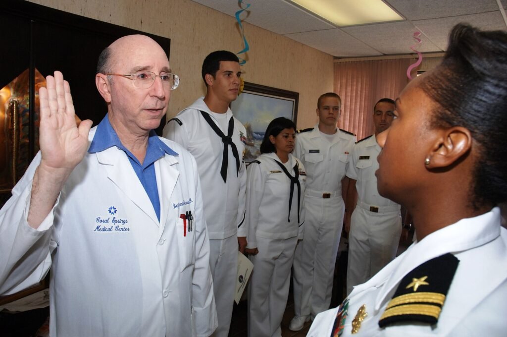 MIAMI, Fla. (June 24, 2010) Dr. N. Benjamin Barnea is sworn in to the U.S. Navy Reserve Medical Corps by Lt. Sheree Will