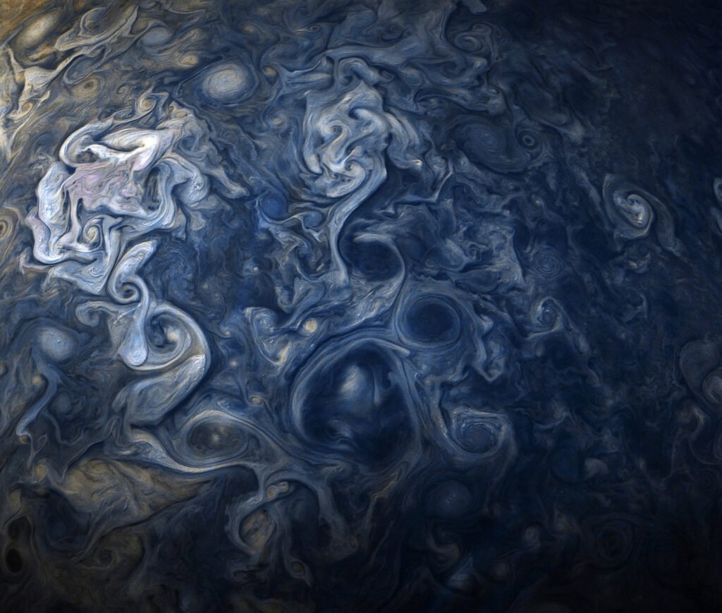 See Jovian clouds in striking shades of blue in this new view taken by NASA's Juno spacecraft. The Juno spacecraft captu